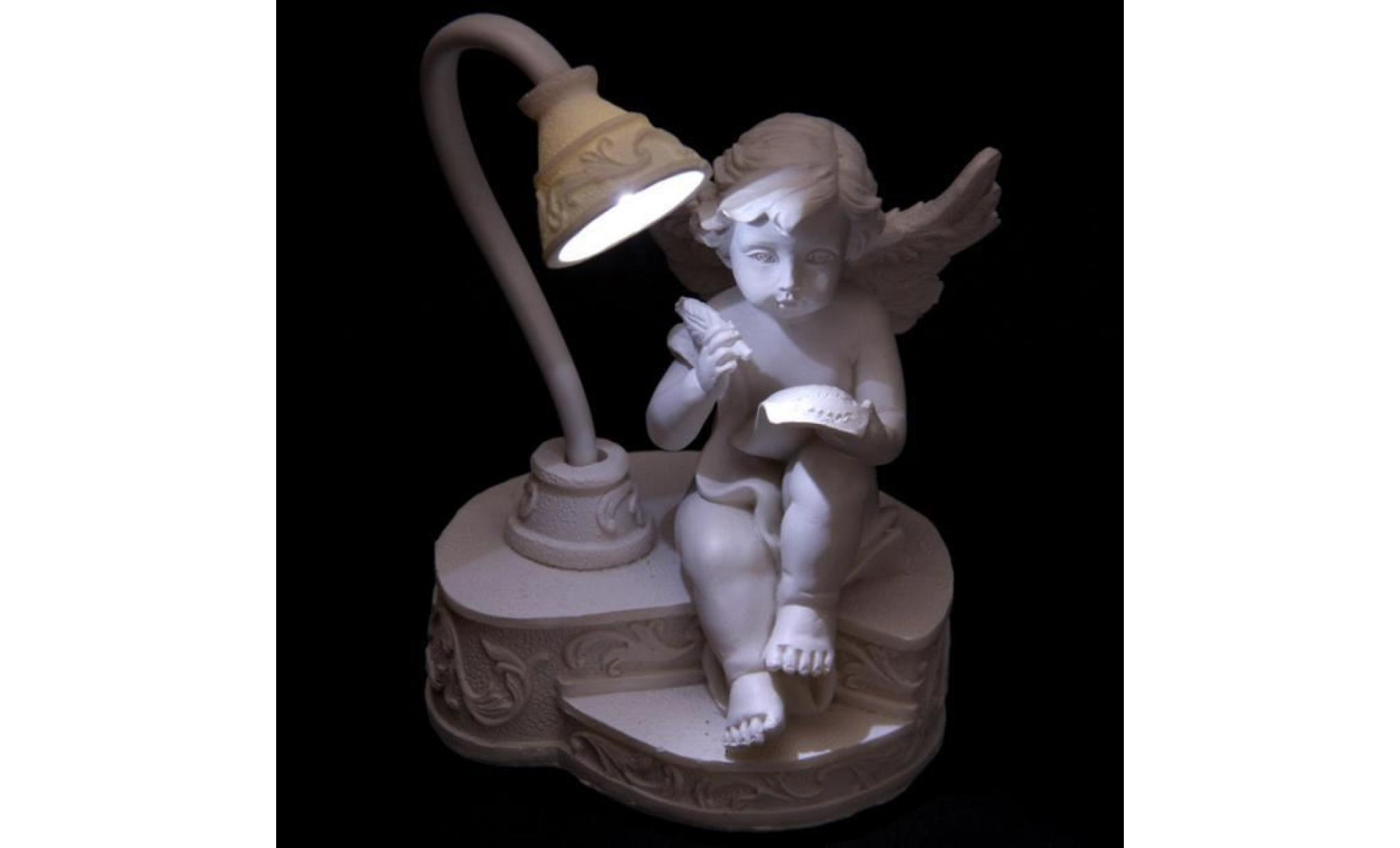 lampe ange cherubin lisant sous une lampe